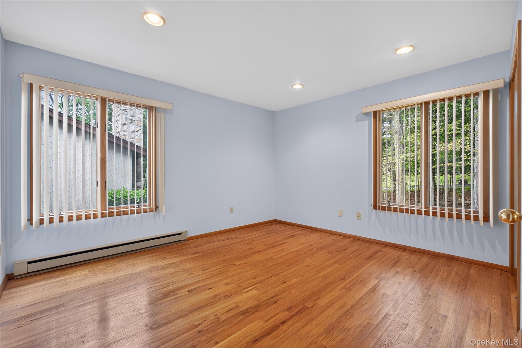 35 Greenlawn Road Amawalk, NY 10501 - Photo 25 of 50 a view of an empty room with wooden floor and a window