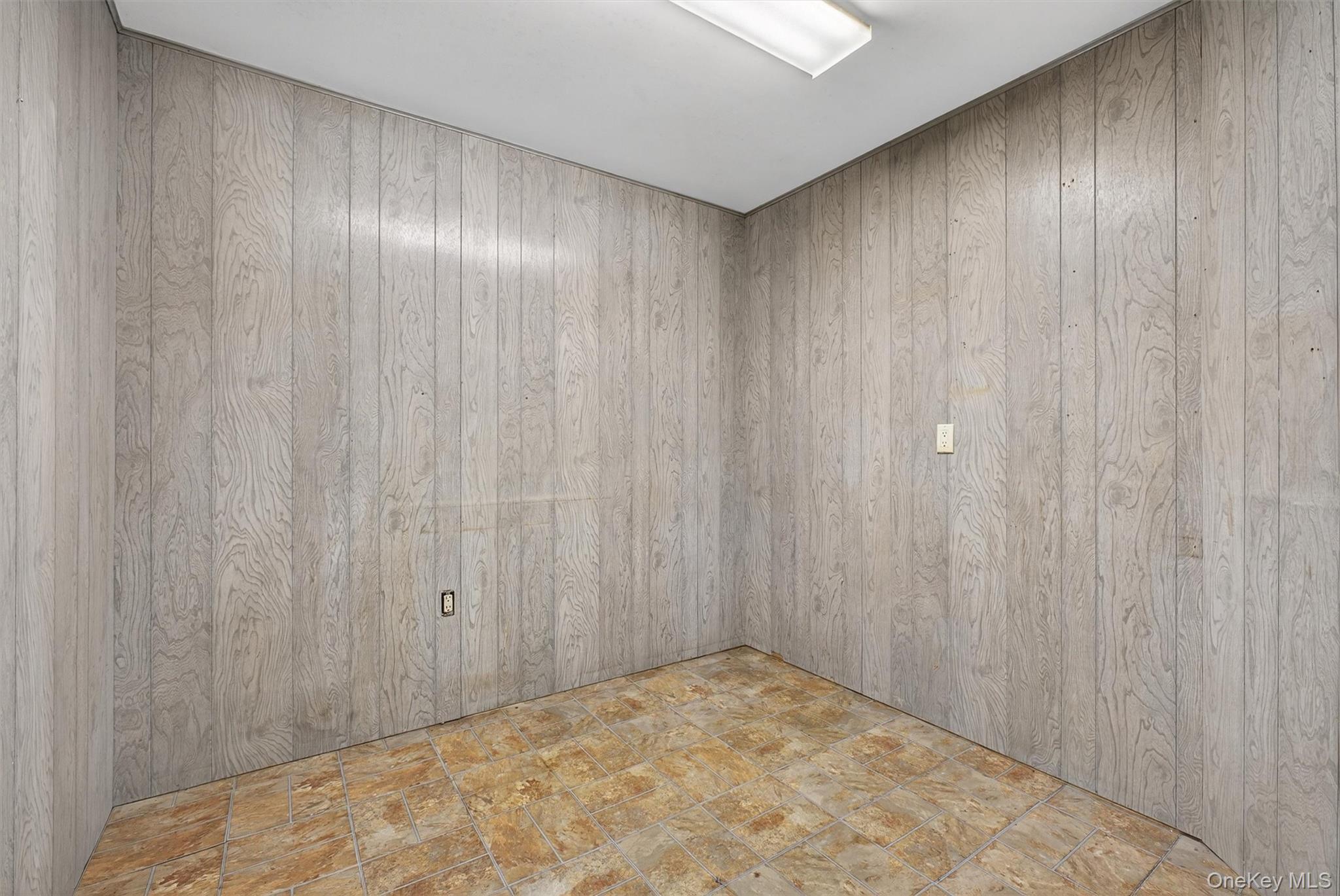 35 Greenlawn Road Amawalk, NY 10501 - Photo 29 of 50 a view of an empty room and wooden walls