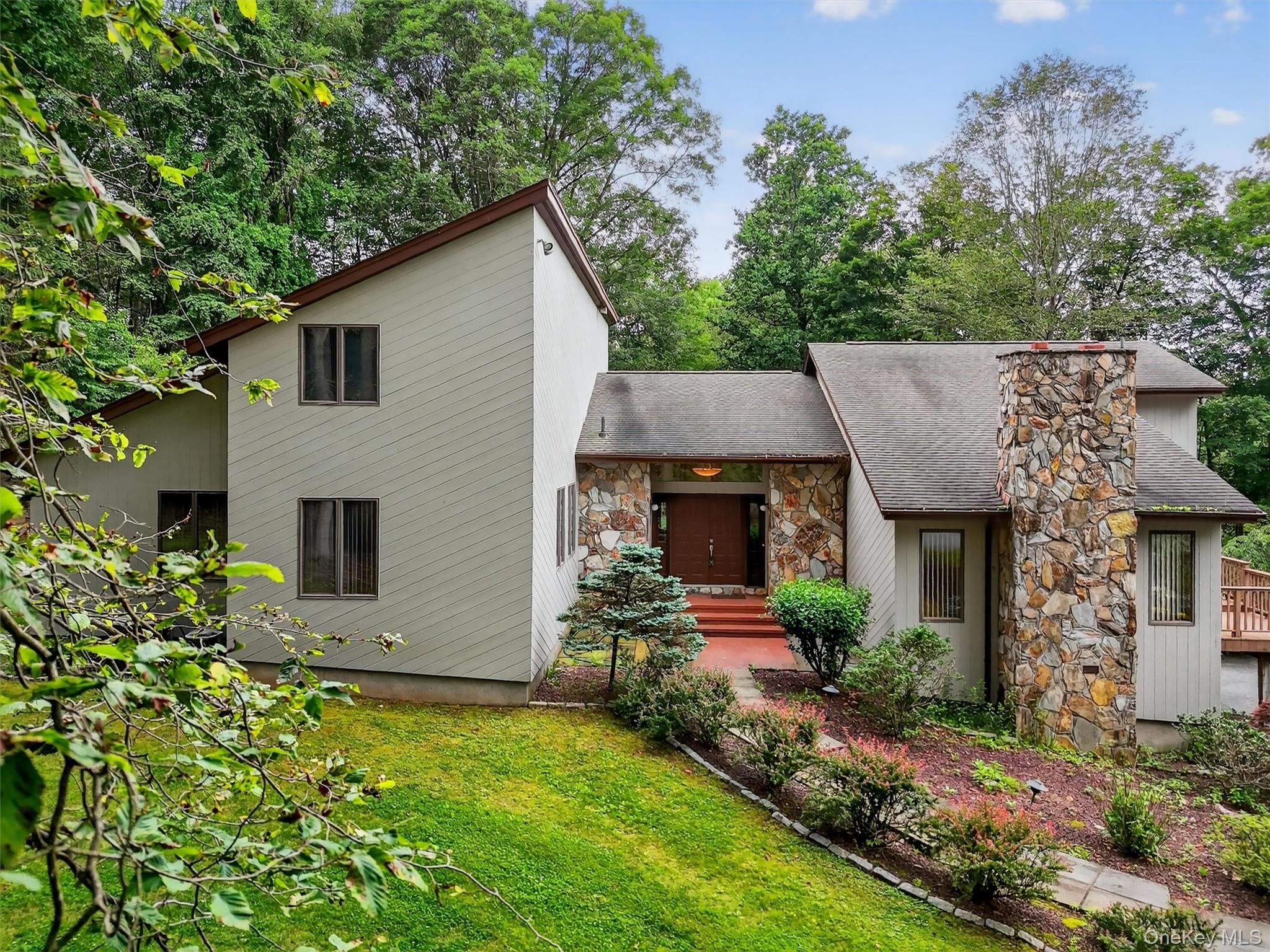 35 Greenlawn Road Amawalk, NY 10501 - Photo 39 of 50 front view of a house with a yard