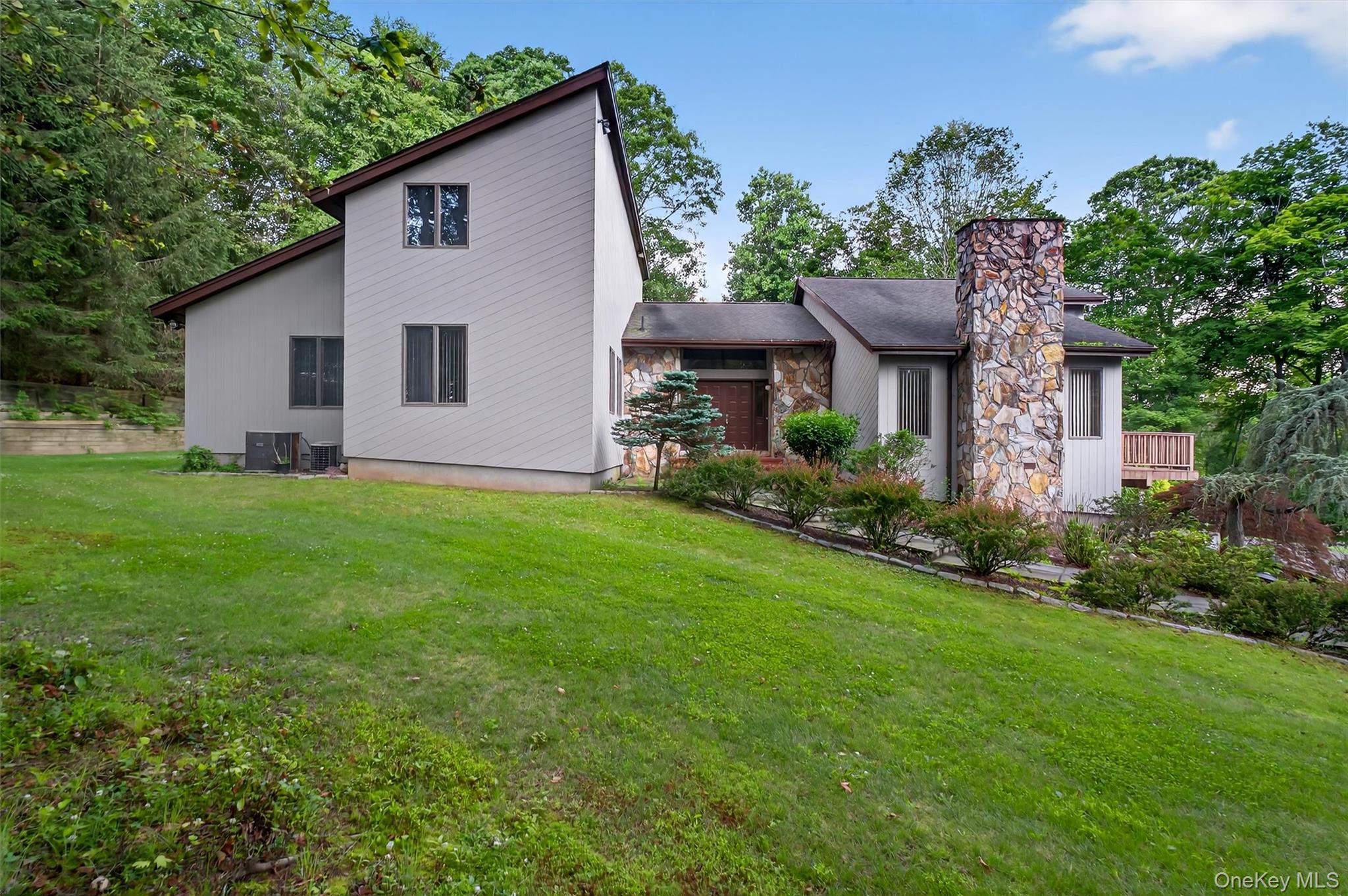 35 Greenlawn Road Amawalk, NY 10501 - Photo 40 of 50 a front view of house with yard and green space