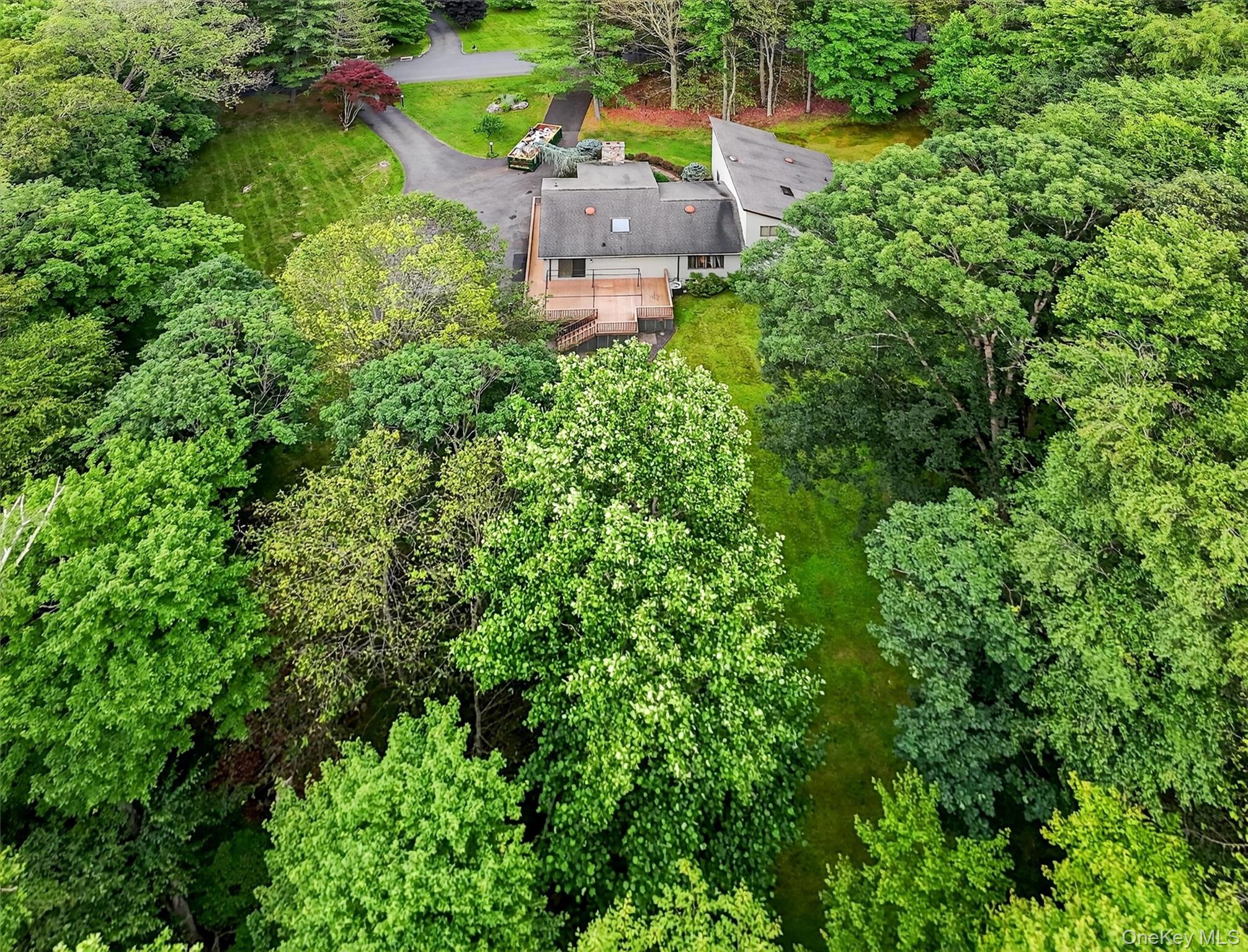 35 Greenlawn Road Amawalk, NY 10501 - Photo 45 of 50 an aerial view of a house with a yard and swimming pool
