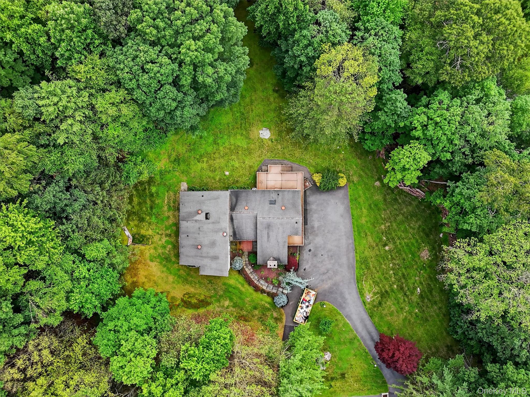 35 Greenlawn Road Amawalk, NY 10501 - Photo 46 of 50 an aerial view of a house with a yard