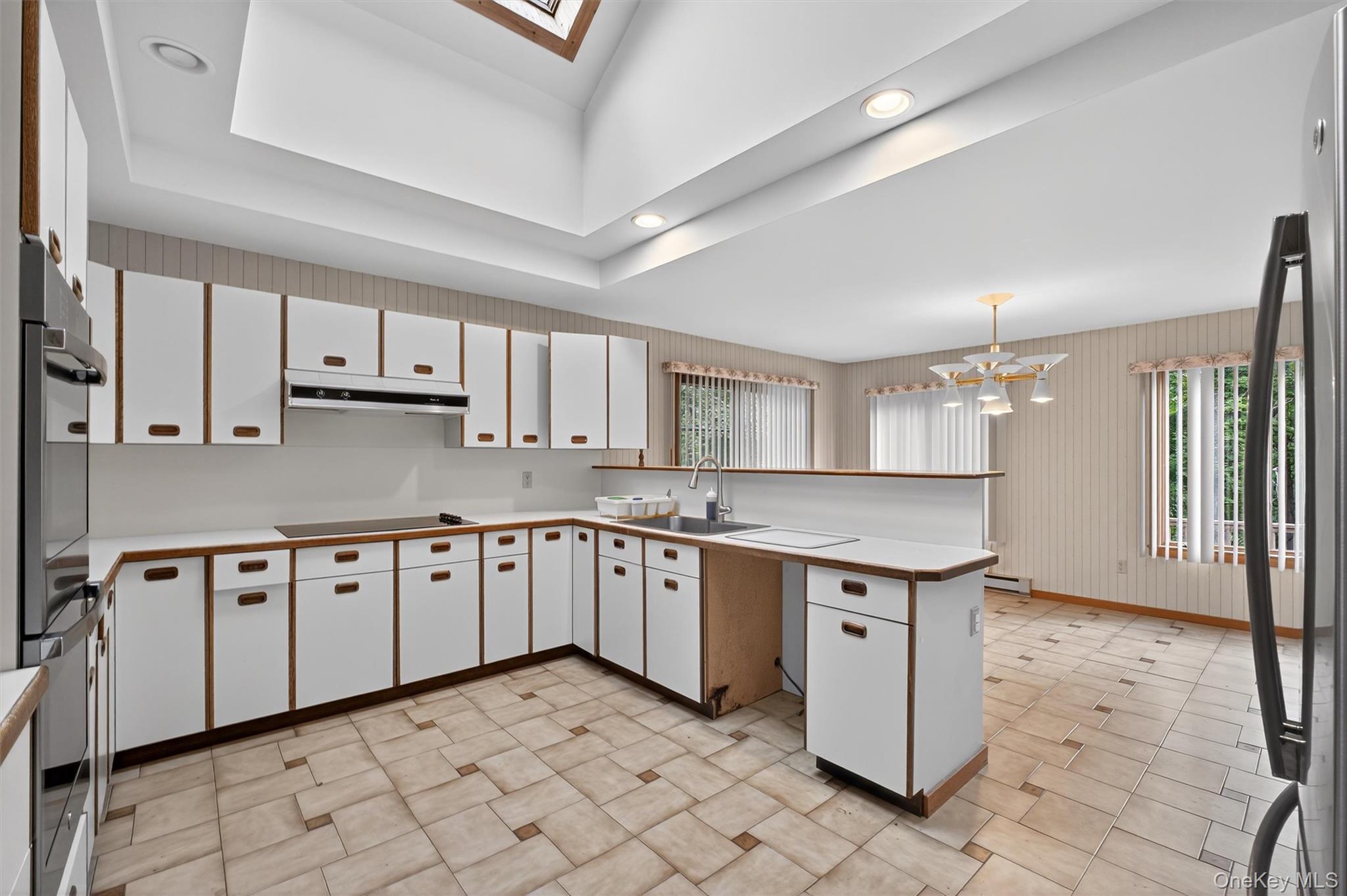 35 Greenlawn Road Amawalk, NY 10501 - Photo 6 of 50 a kitchen with stainless steel appliances granite countertop a sink and cabinets