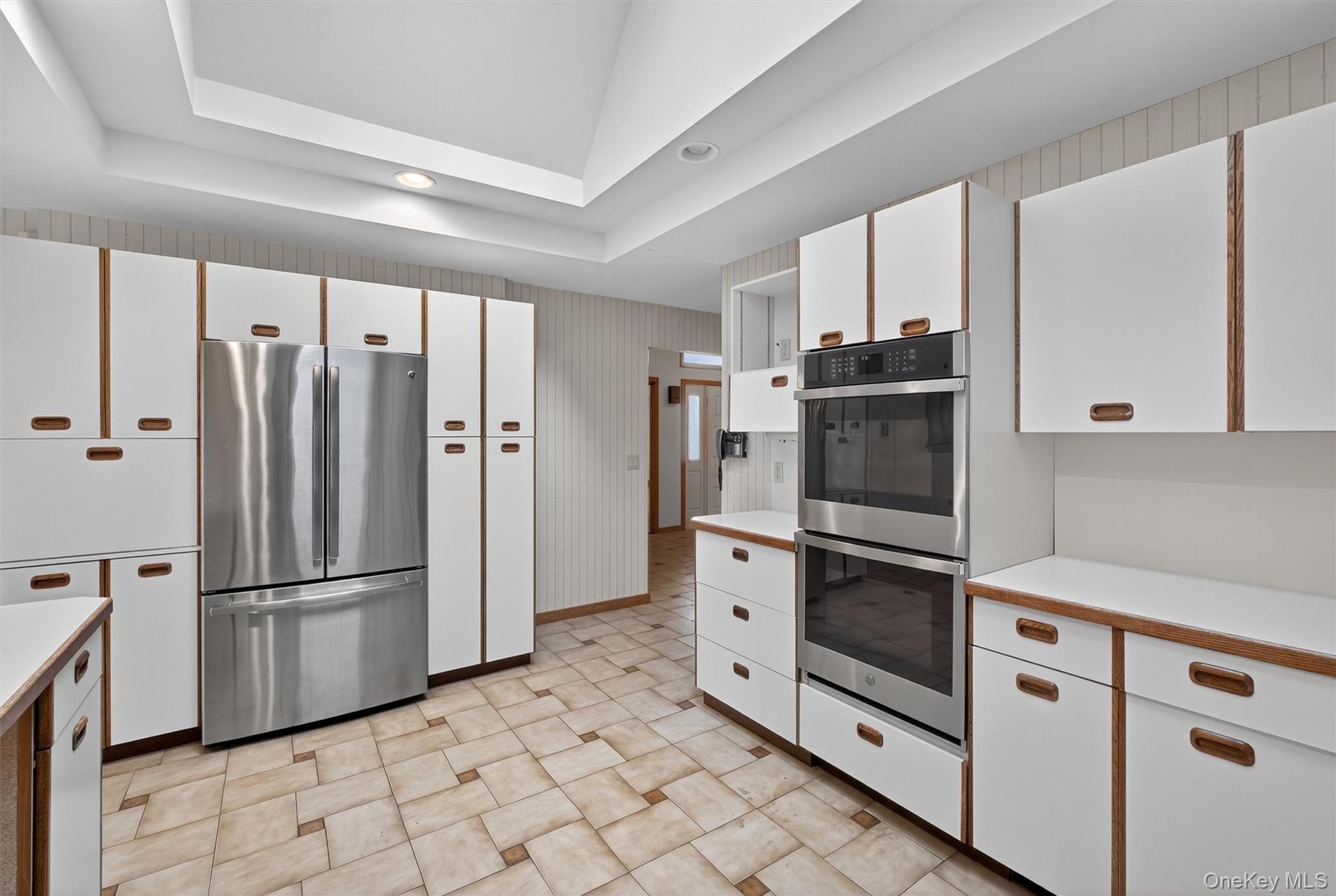 35 Greenlawn Road Amawalk, NY 10501 - Photo 8 of 50 a kitchen with stainless steel appliances a refrigerator sink and microwave
