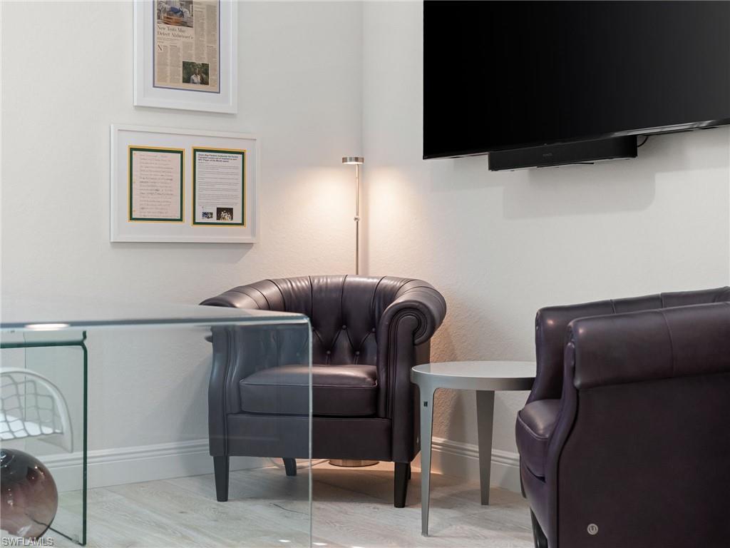 4199 11th Avenue Southwest Naples, FL 34116 - Photo 13 of 36 a couple of chairs in a room