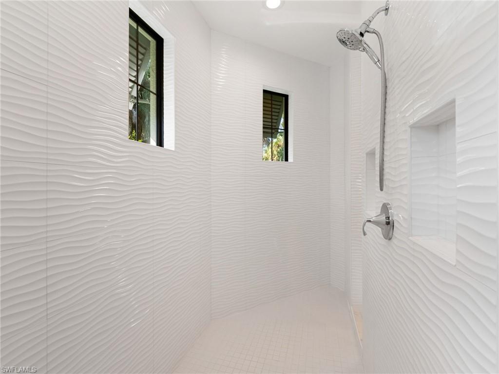 4199 11th Avenue Southwest Naples, FL 34116 - Photo 26 of 36 a bathroom with a shower