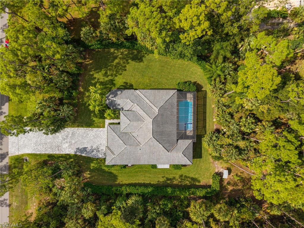 4199 11th Avenue Southwest Naples, FL 34116 - Photo 36 of 36 an aerial view of a house with a yard