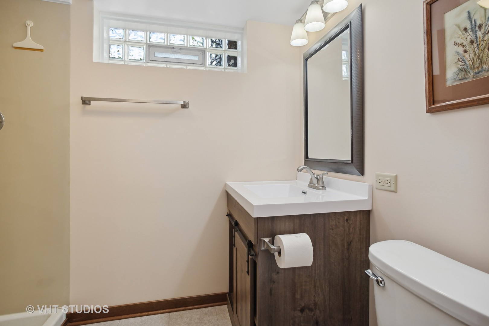 556 Pinehurst Drive Des Plaines, IL 60016 - Photo 12 of 18 a bathroom with a sink and mirror with toilet
