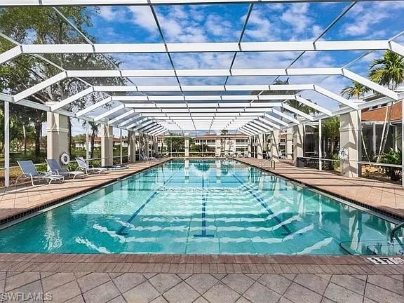 3157 Sundance Circle Naples, FL 34109 - Photo 49 of 50 View of pool with a lanai