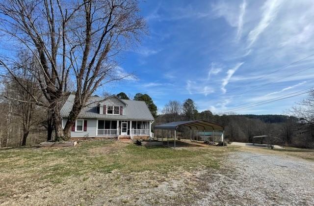 727 Lattimore Road Rutherfordton, NC 28139 - Photo 1 of 48 a front view of a house with a yard