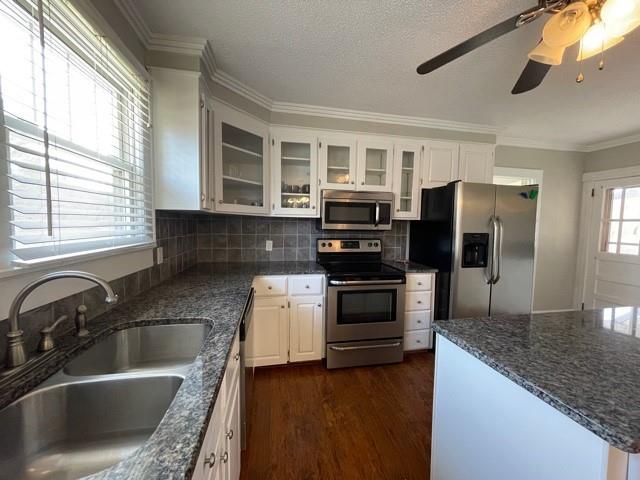 727 Lattimore Road Rutherfordton, NC 28139 - Photo 3 of 48 a kitchen with granite countertop a sink and steel appliances