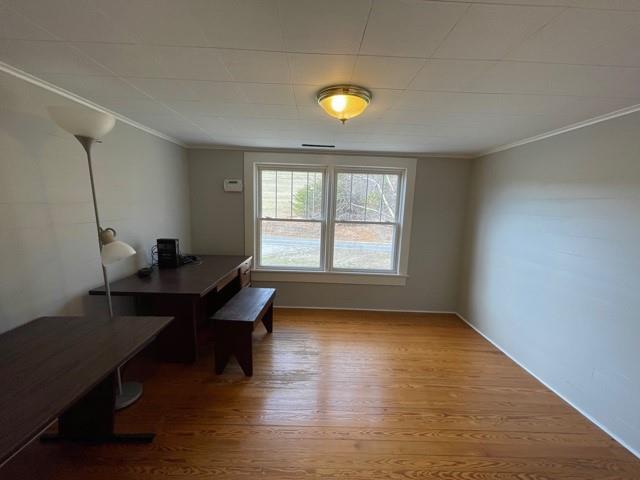 727 Lattimore Road Rutherfordton, NC 28139 - Photo 31 of 48 a view of a workspace with furniture and a window
