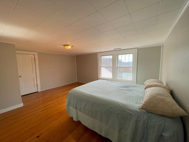 727 Lattimore Road Rutherfordton, NC 28139 - Photo 33 of 48 a bed sitting in a bedroom next to a window