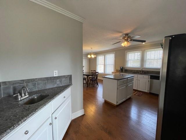 727 Lattimore Road Rutherfordton, NC 28139 - Photo 4 of 48 a large white kitchen with a large window