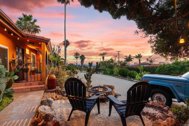 a view of a terrace with sitting area