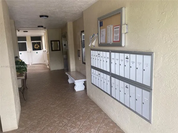 a view of a chairs and table in a kitchen