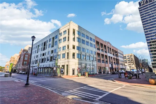 a view of a building with a street