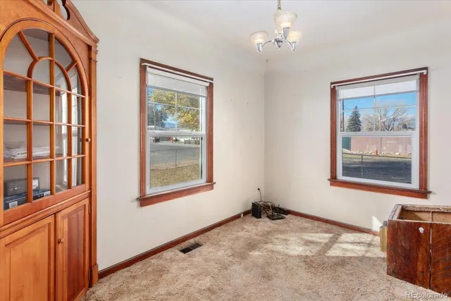 an entryway with a chandelier