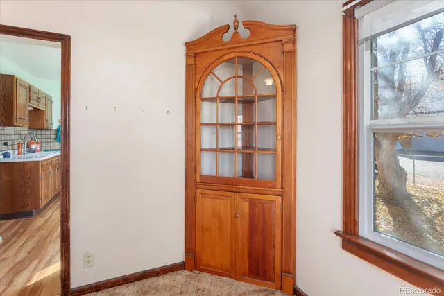 a kitchen with stainless steel appliances kitchen island granite countertop a stove a sink and a refrigerator