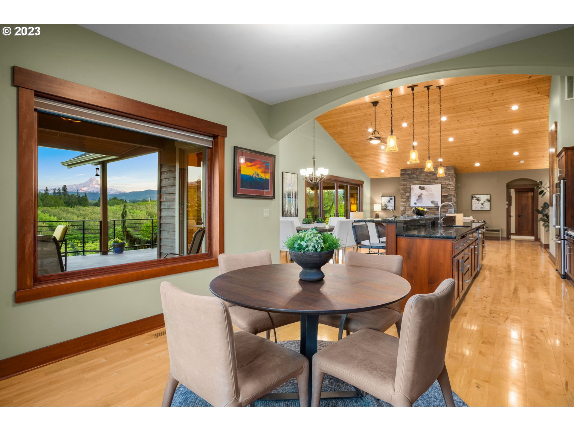1575 Nunamaker Road Hood River, OR 97031 - Photo 15 of 48 a dining room with furniture and a large window