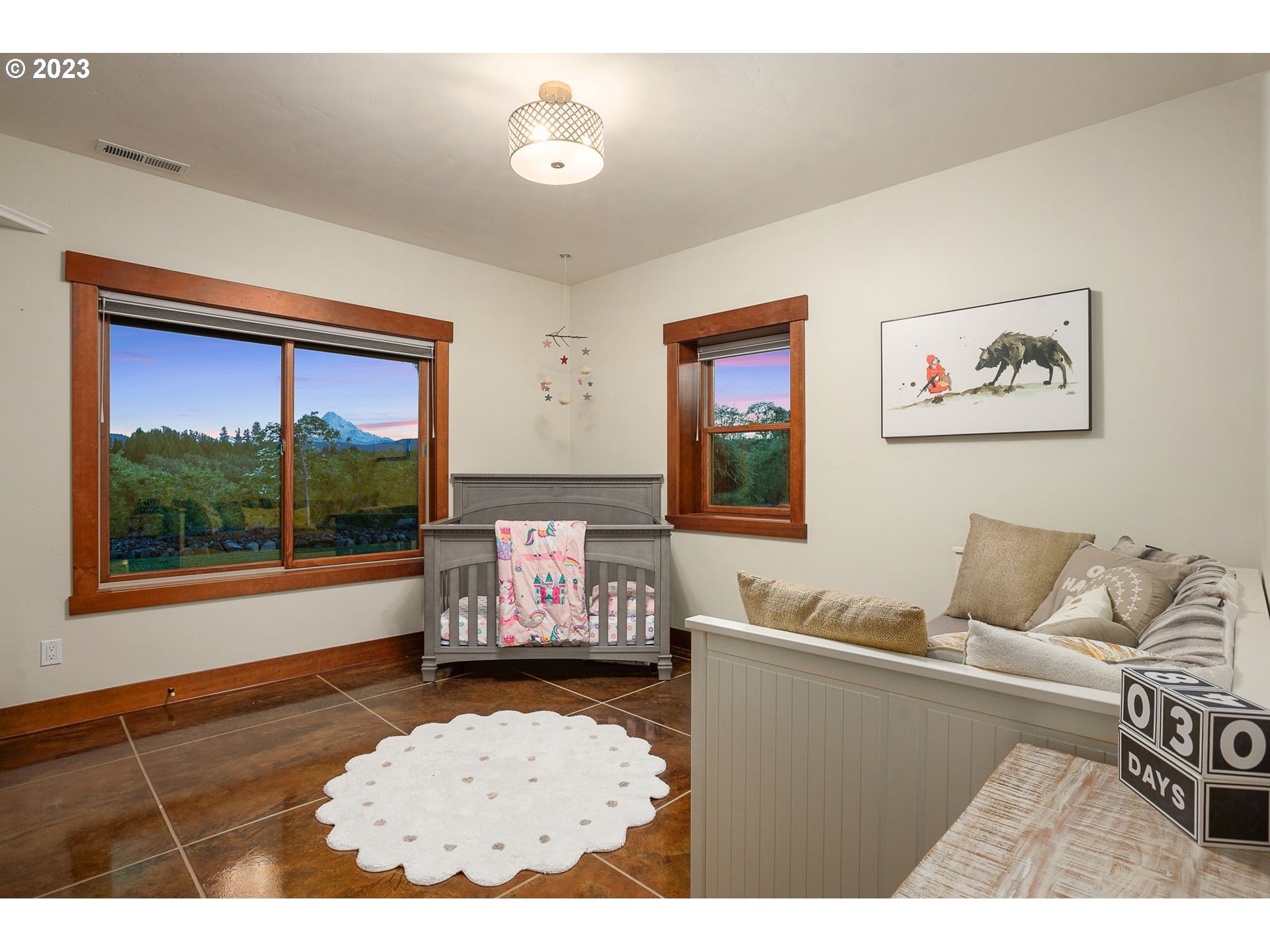 1575 Nunamaker Road Hood River, OR 97031 - Photo 27 of 48 a living room with furniture and a flat screen tv
