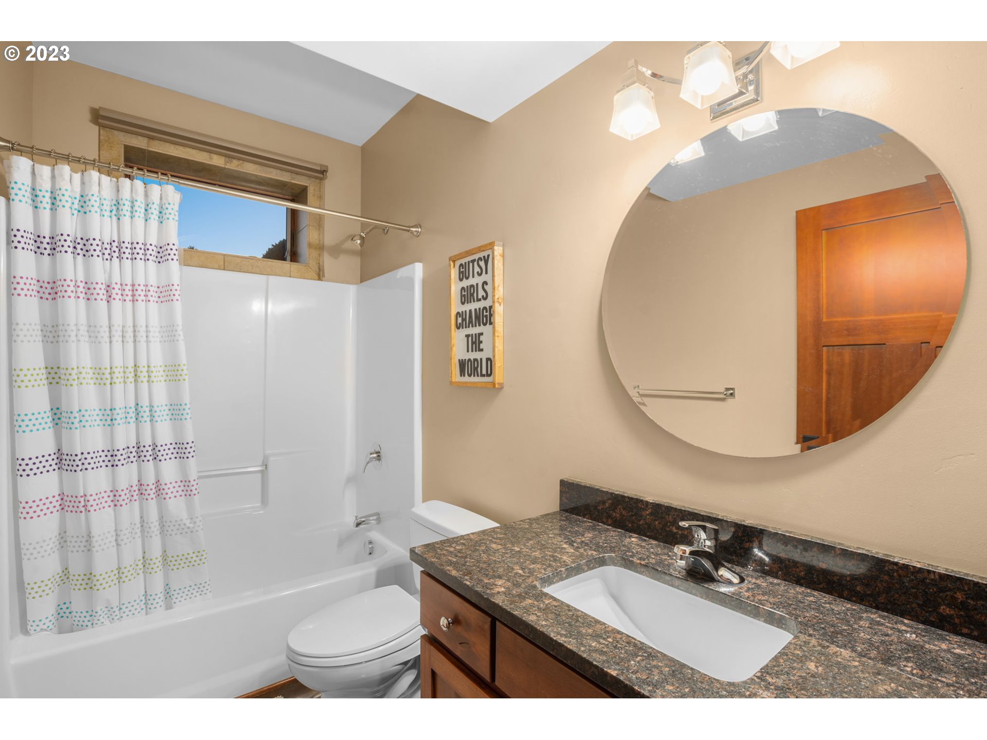 1575 Nunamaker Road Hood River, OR 97031 - Photo 28 of 48 a bathroom with a granite countertop sink a toilet a mirror and shower