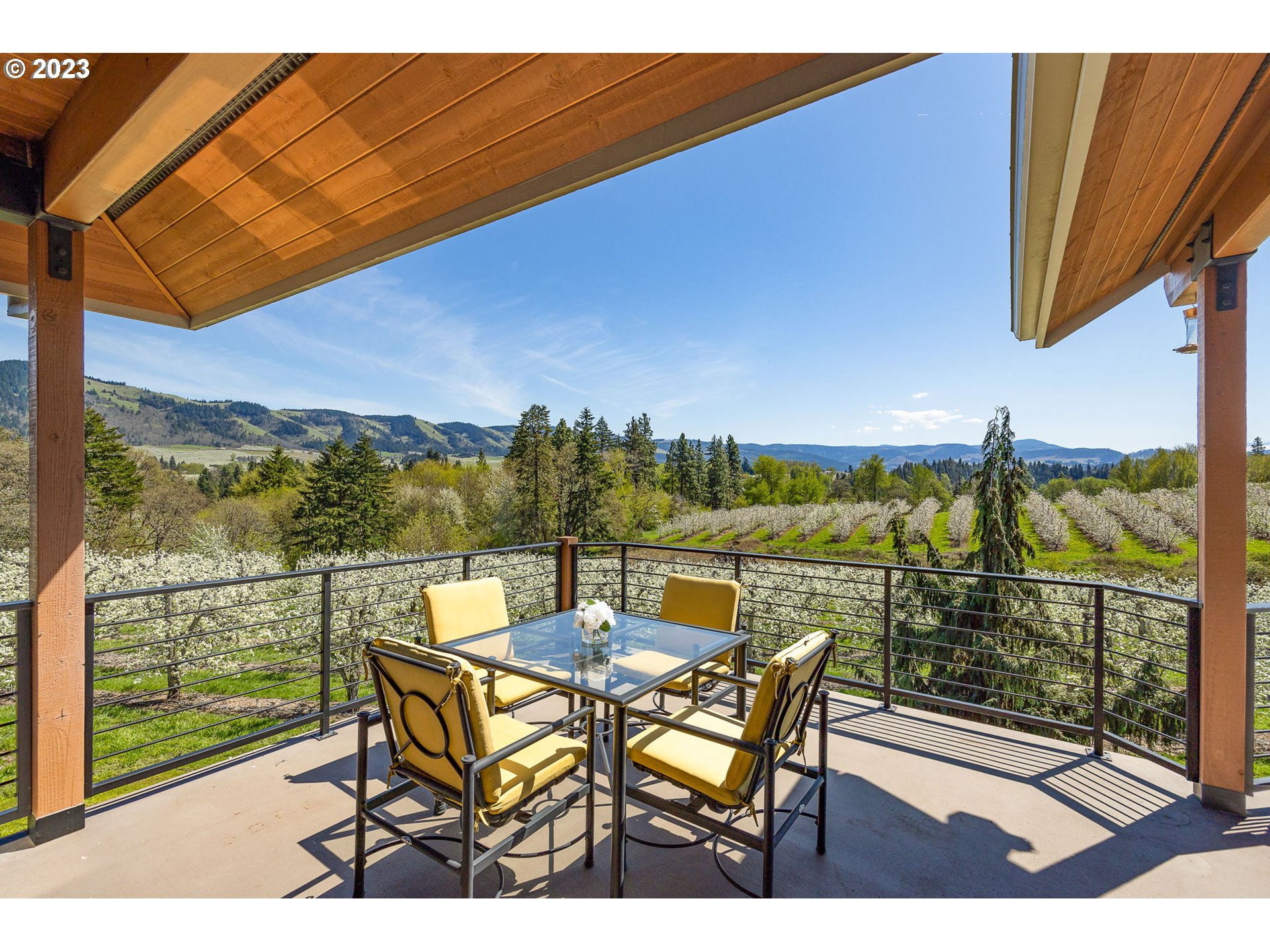 1575 Nunamaker Road Hood River, OR 97031 - Photo 34 of 48 a view of a chairs and table in patio