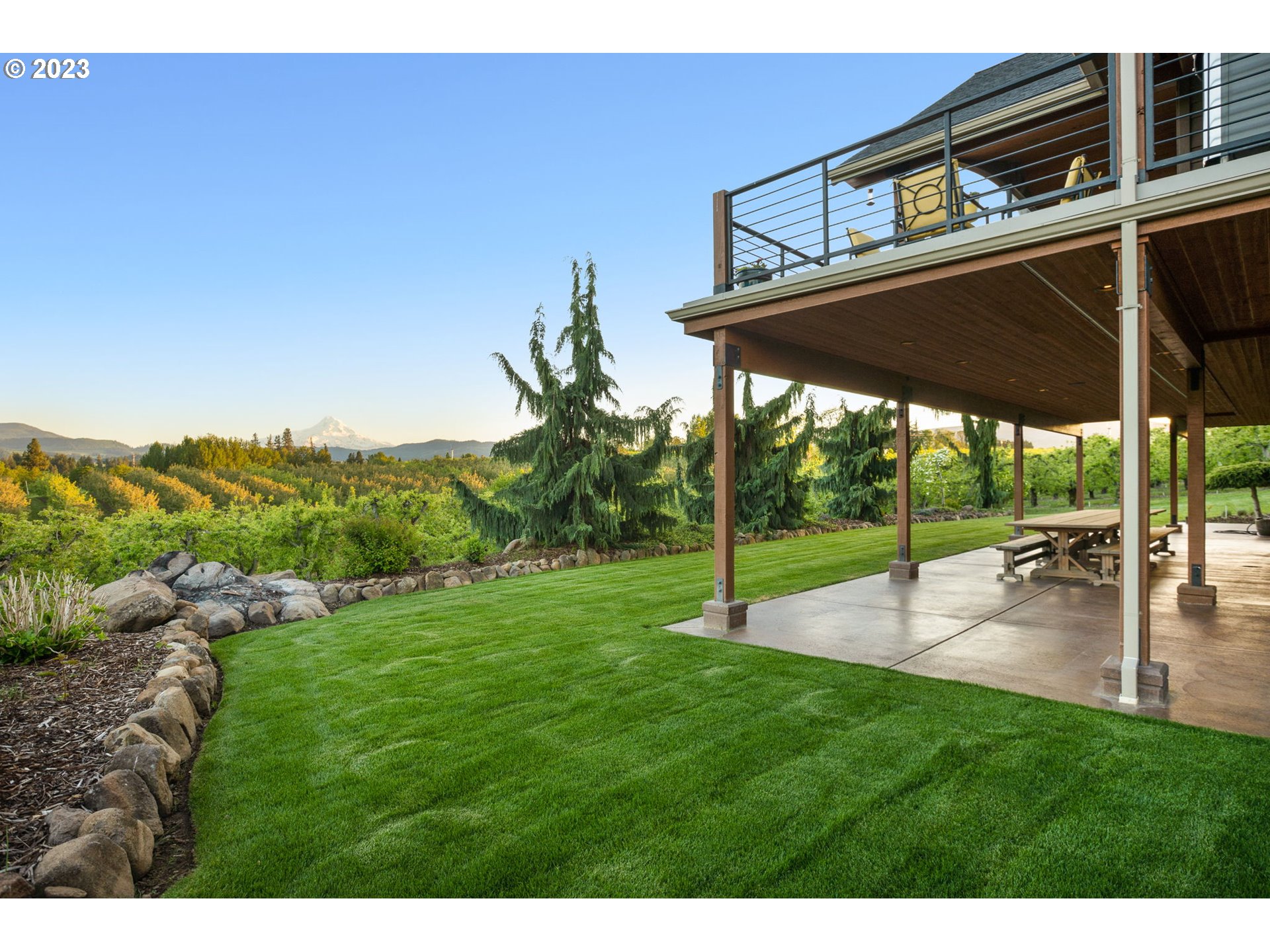1575 Nunamaker Road Hood River, OR 97031 - Photo 40 of 48 a view of a backyard with a garden and plants