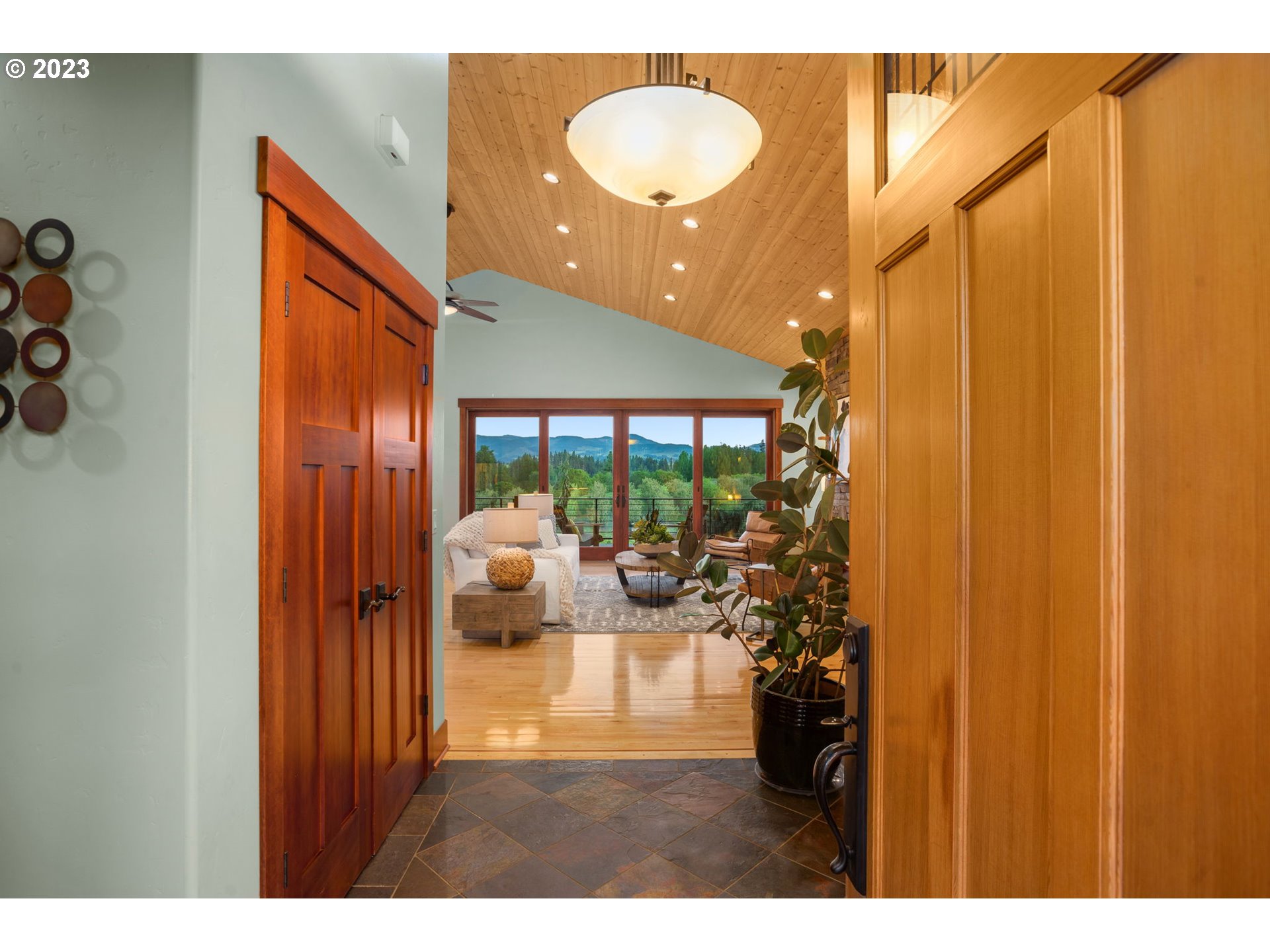 1575 Nunamaker Road Hood River, OR 97031 - Photo 4 of 48 a very nice looking room with a large window and a dining table