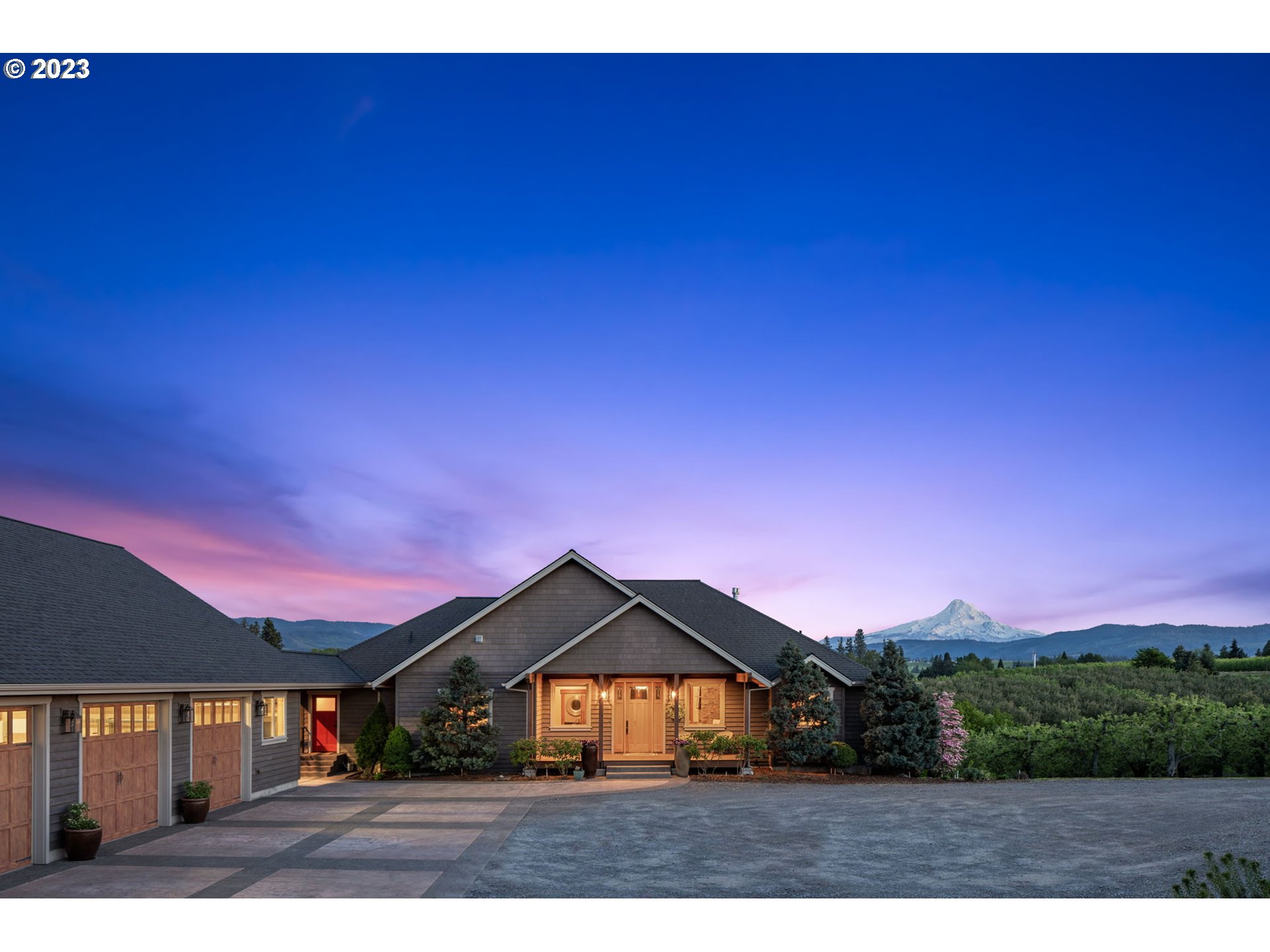 1575 Nunamaker Road Hood River, OR 97031 - Photo 44 of 48 a view of house with yard and mountain view