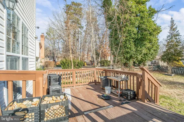a view of a balcony with wooden floor