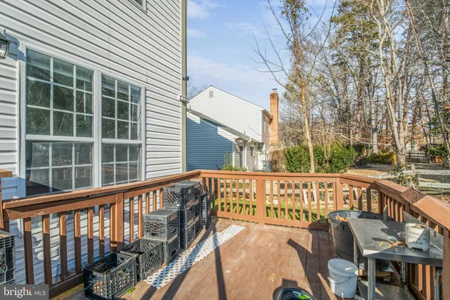 a view of a chairs and tables in the balcony