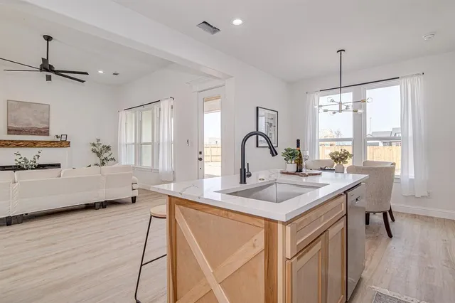 a view of living room with granite countertop furniture and fireplace