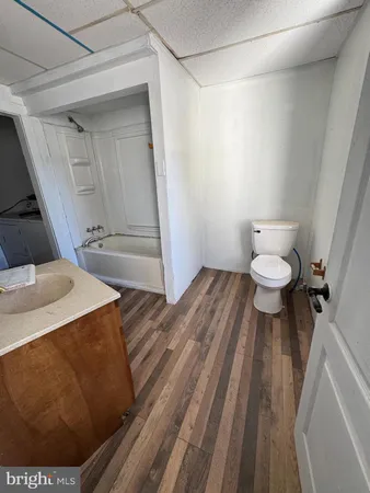 a bathroom with a sink and a toilet