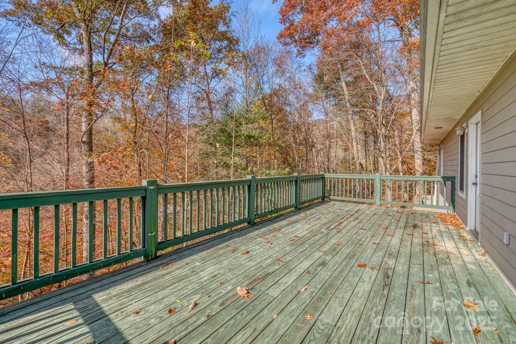 534 Parson Branch Road Green Mountain, NC 28740 - Photo 14 of 47 a view of balcony with wooden floor