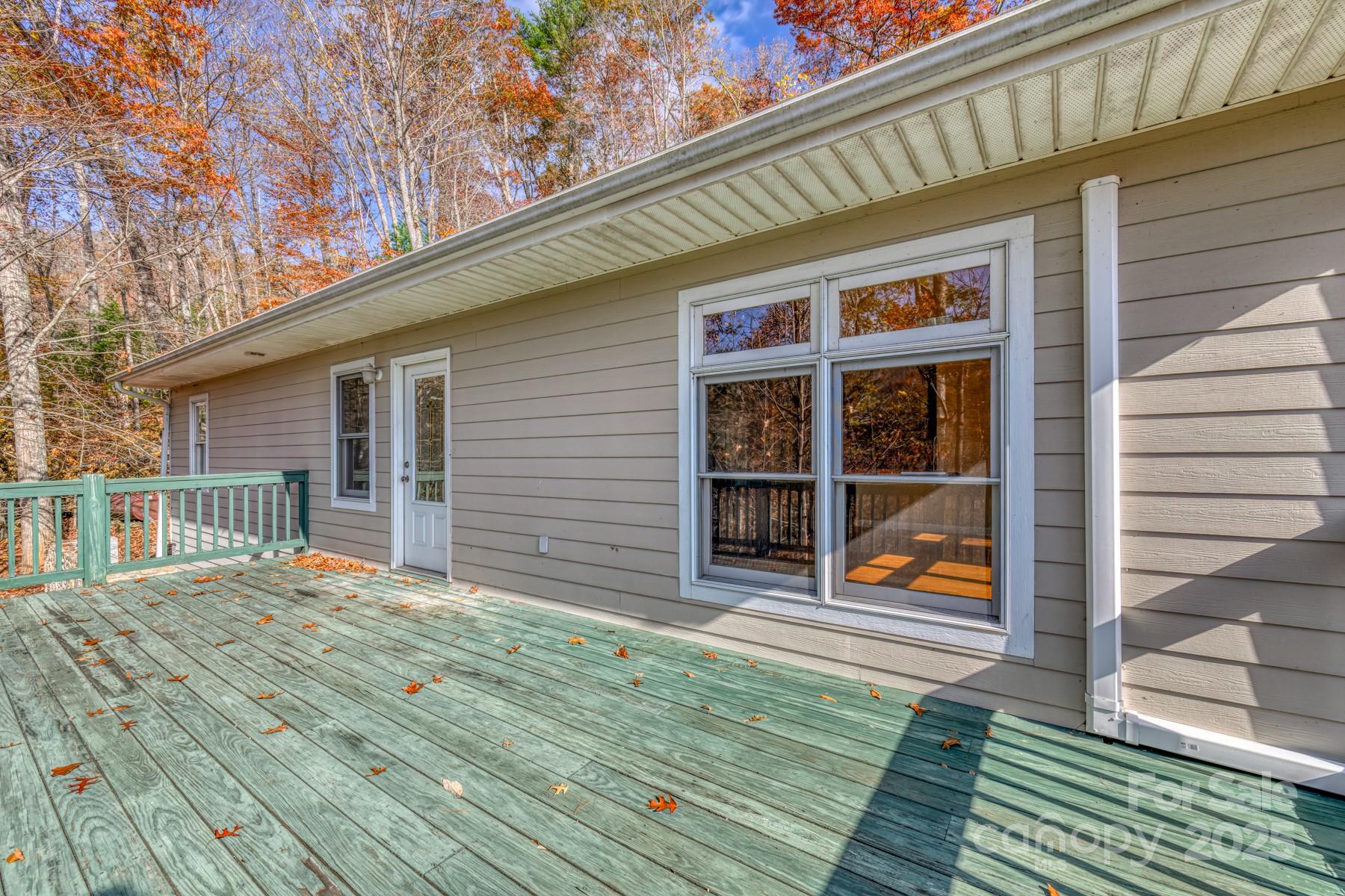 534 Parson Branch Road Green Mountain, NC 28740 - Photo 15 of 47 a balcony view with a outdoor seating