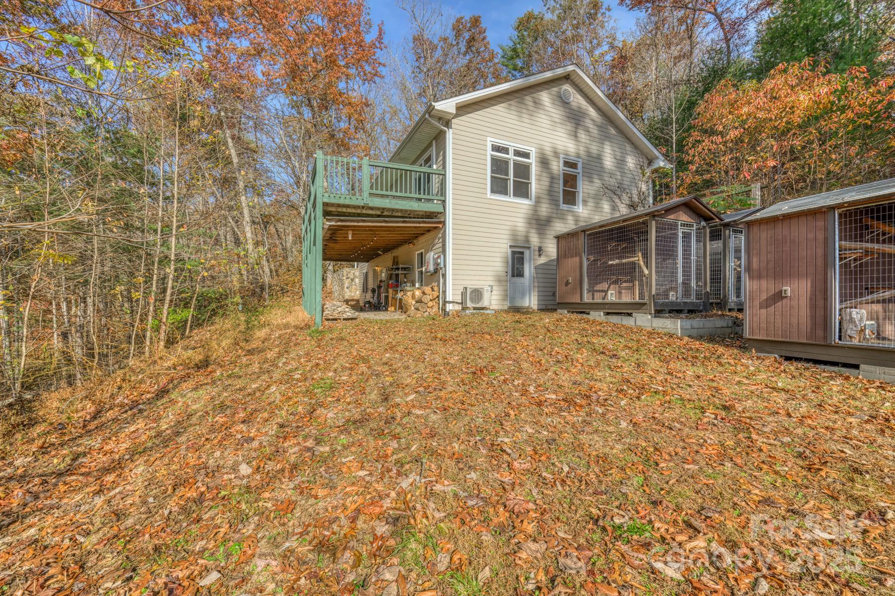 534 Parson Branch Road Green Mountain, NC 28740 - Photo 40 of 47 a view of a house with a yard
