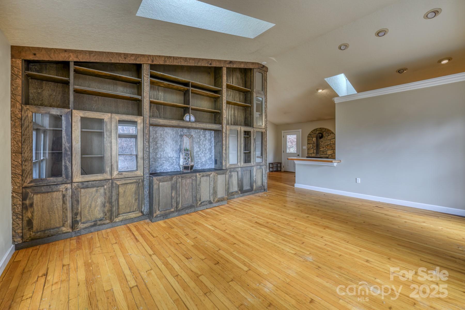 534 Parson Branch Road Green Mountain, NC 28740 - Photo 5 of 47 a view of empty room with wooden floor