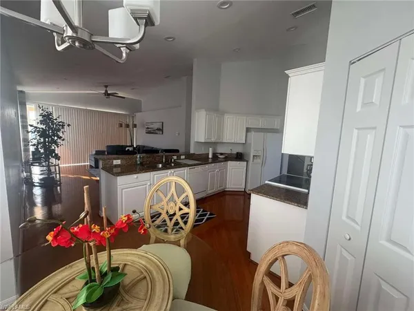 a bathroom with a sink double vanity and mirror