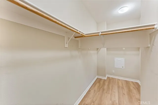 a bathroom with a double vanity sink mirror and toilet
