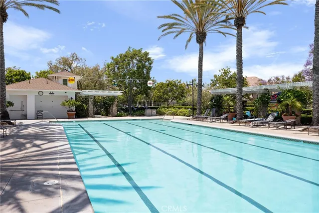 a view of yard with ocean and mountain in the back