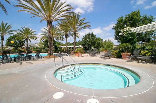 a view of a park with swings and slides