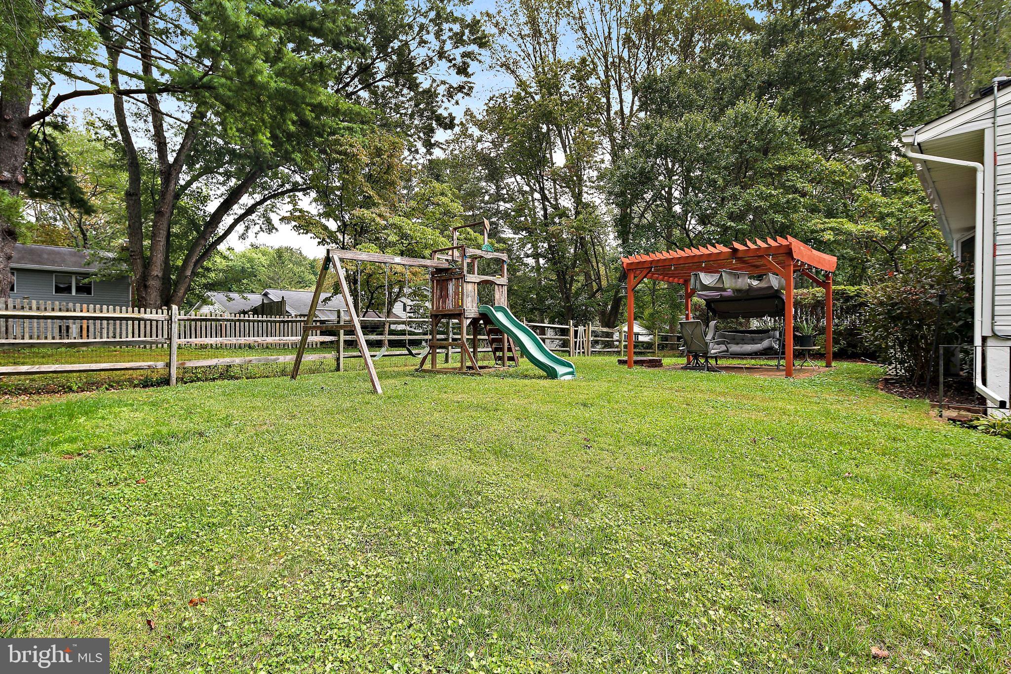 5033 Three Kings Lane Columbia, MD 21044 - Photo 18 of 37 a view of a park with slide