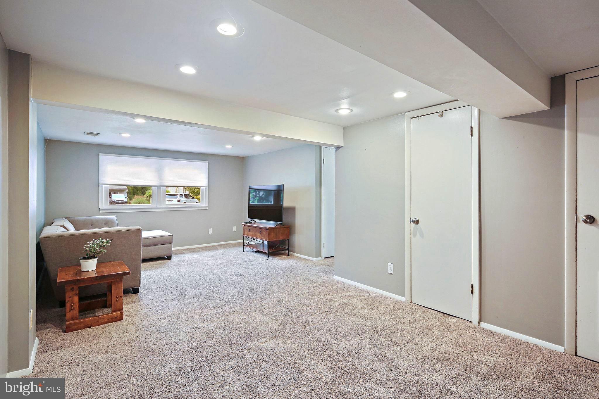 5033 Three Kings Lane Columbia, MD 21044 - Photo 30 of 37 a view of a livingroom with furniture and window