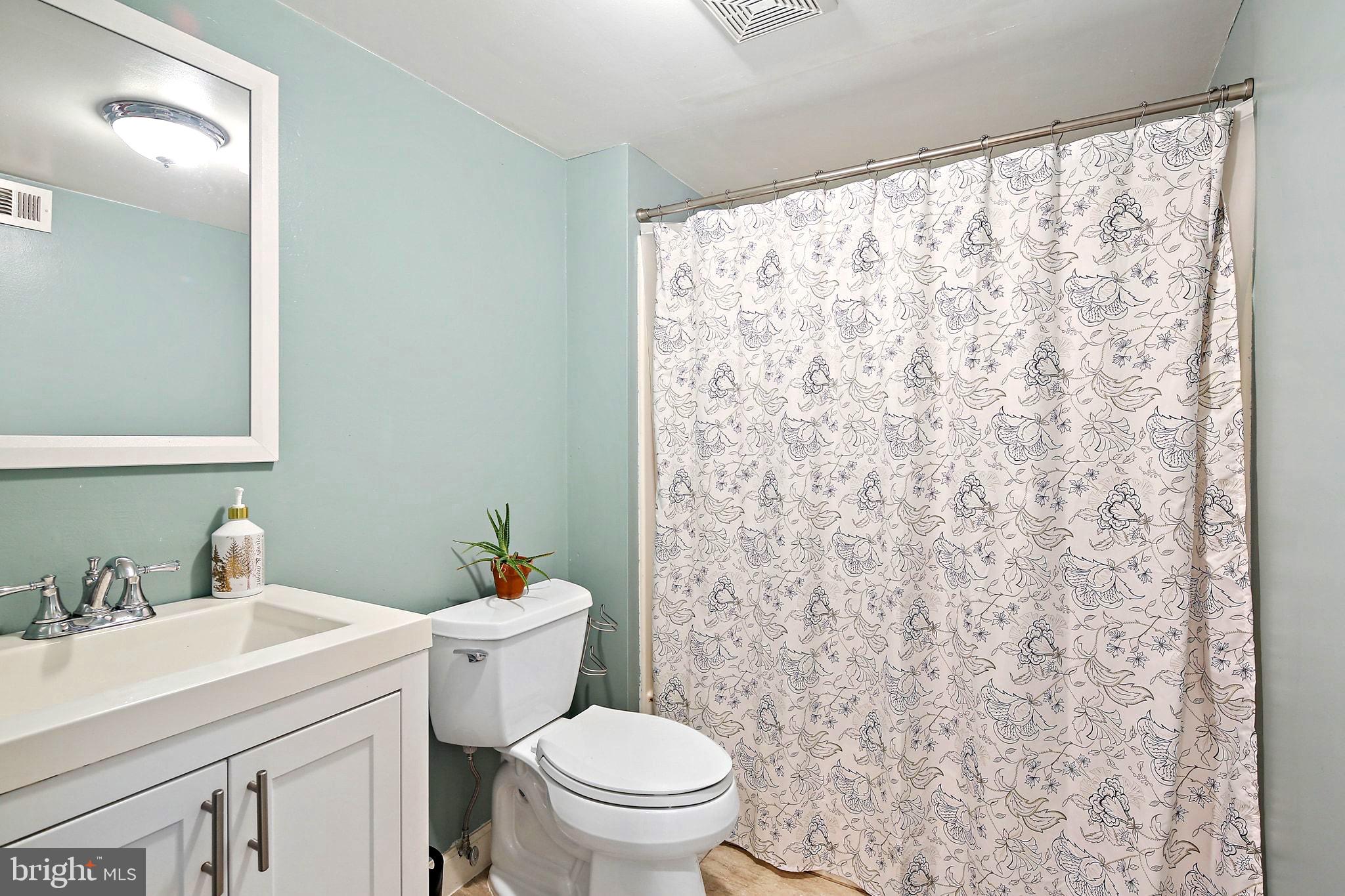 5033 Three Kings Lane Columbia, MD 21044 - Photo 33 of 37 a bathroom with a sink and a toilet