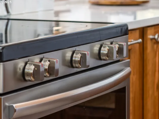 a view of an entryway with wooden floor and door