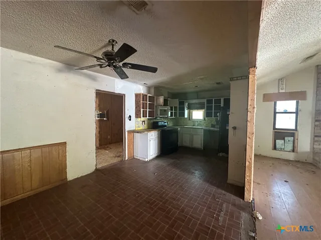 a view of backyard with green space