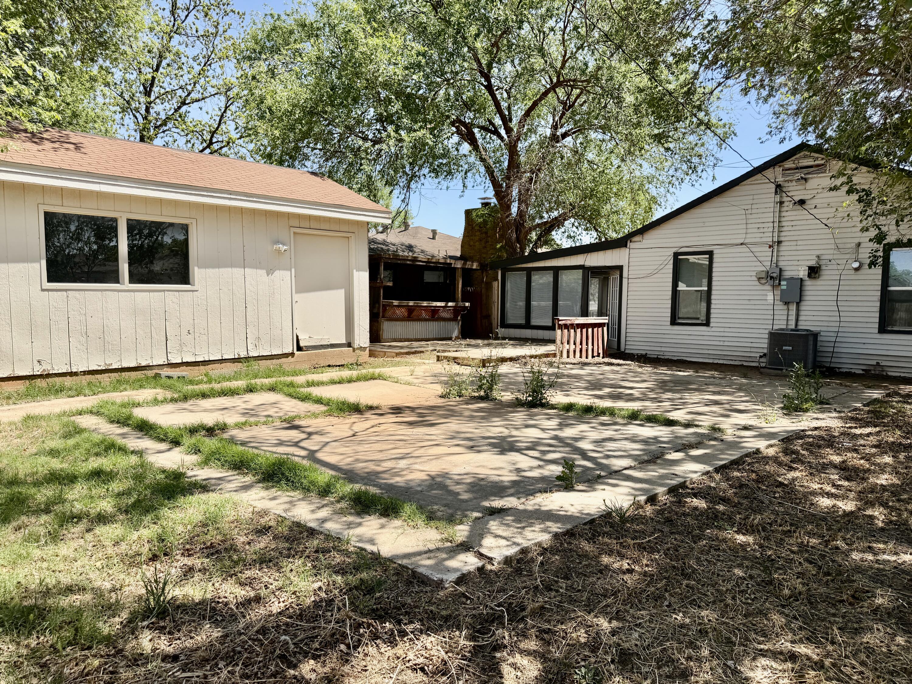 4818 36th Street Lubbock, TX 79414 - Photo 25 of 25 a backyard of a house