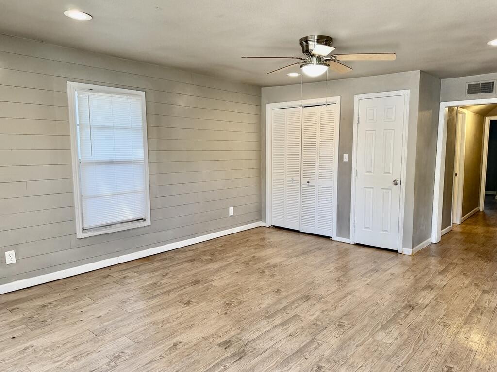 4818 36th Street Lubbock, TX 79414 - Photo 3 of 25 a view of an empty room with a window