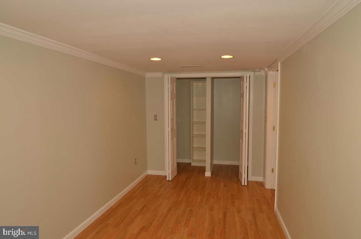 6104 Chanceford Road Baltimore, MD 21228 - Photo 10 of 17 a view of hallway with wooden floor